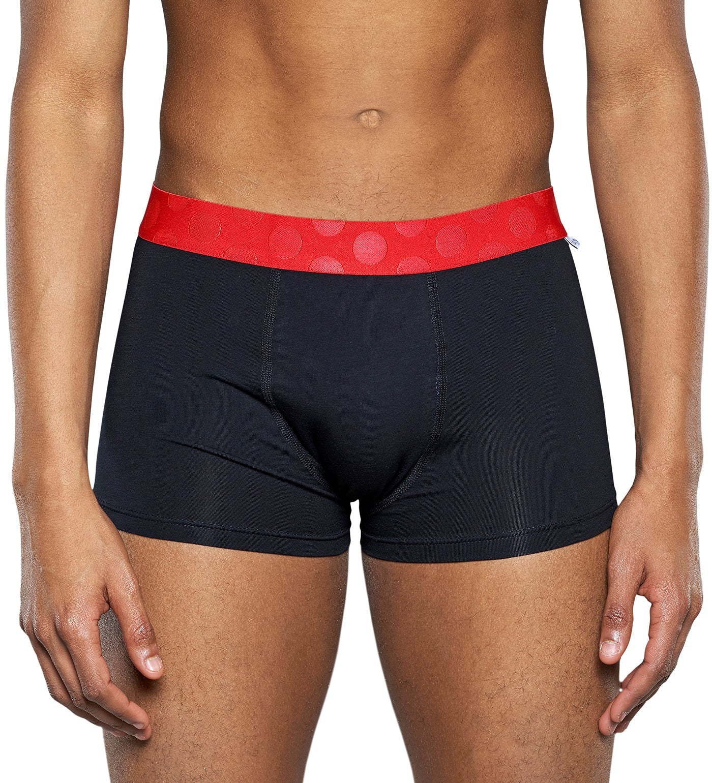 Three pairs of men's trunks from Happy Socks 3-Pack Contrast featuring vibrant colors and contrasting waistband details.