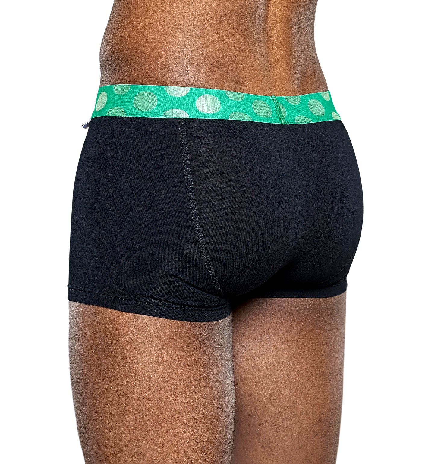 Three pairs of men's trunks from Happy Socks 3-Pack Contrast featuring vibrant colors and contrasting waistband details.