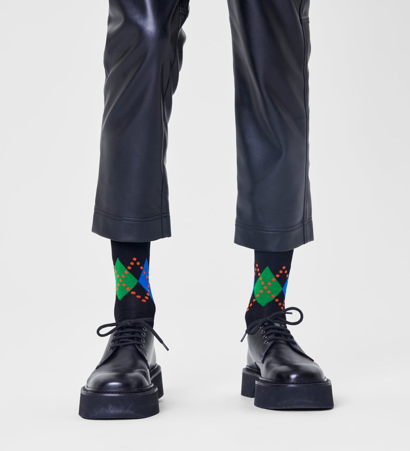 Brightly patterned Happy Socks Dressed Jaxon crew-length socks for men, adding fun and style to any outfit.