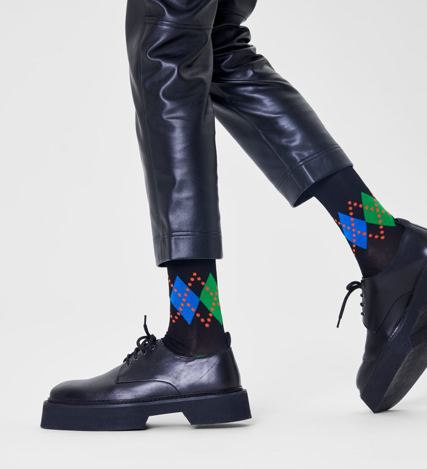 Brightly patterned Happy Socks Dressed Jaxon crew-length socks for men, adding fun and style to any outfit.
