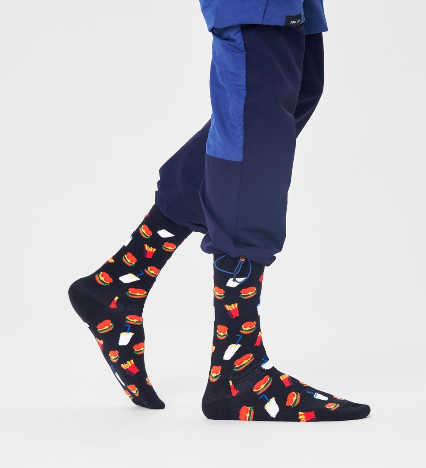 Bright, playful Happy Socks unisex hamburger crew socks for women and men, featuring colorful burger designs on soft, comfy fabric.