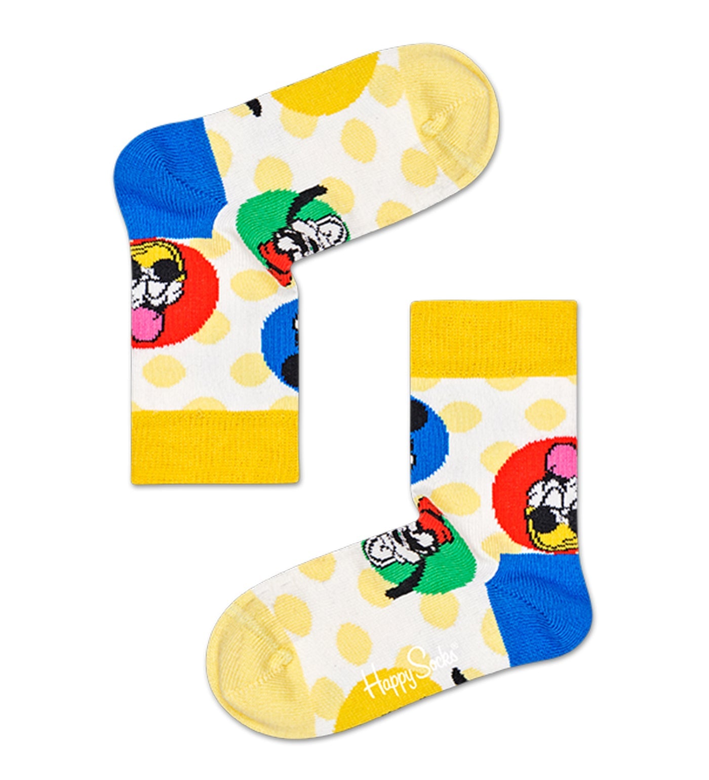 White crew socks with bold yellow polka dots and colorful cartoon character faces, accented with blue, yellow, and red heels and toes.