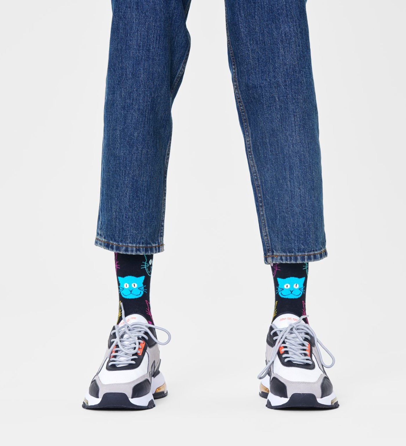 Colorful cat-themed crew socks designed for both women and men, perfect for fun and comfortable everyday wear.