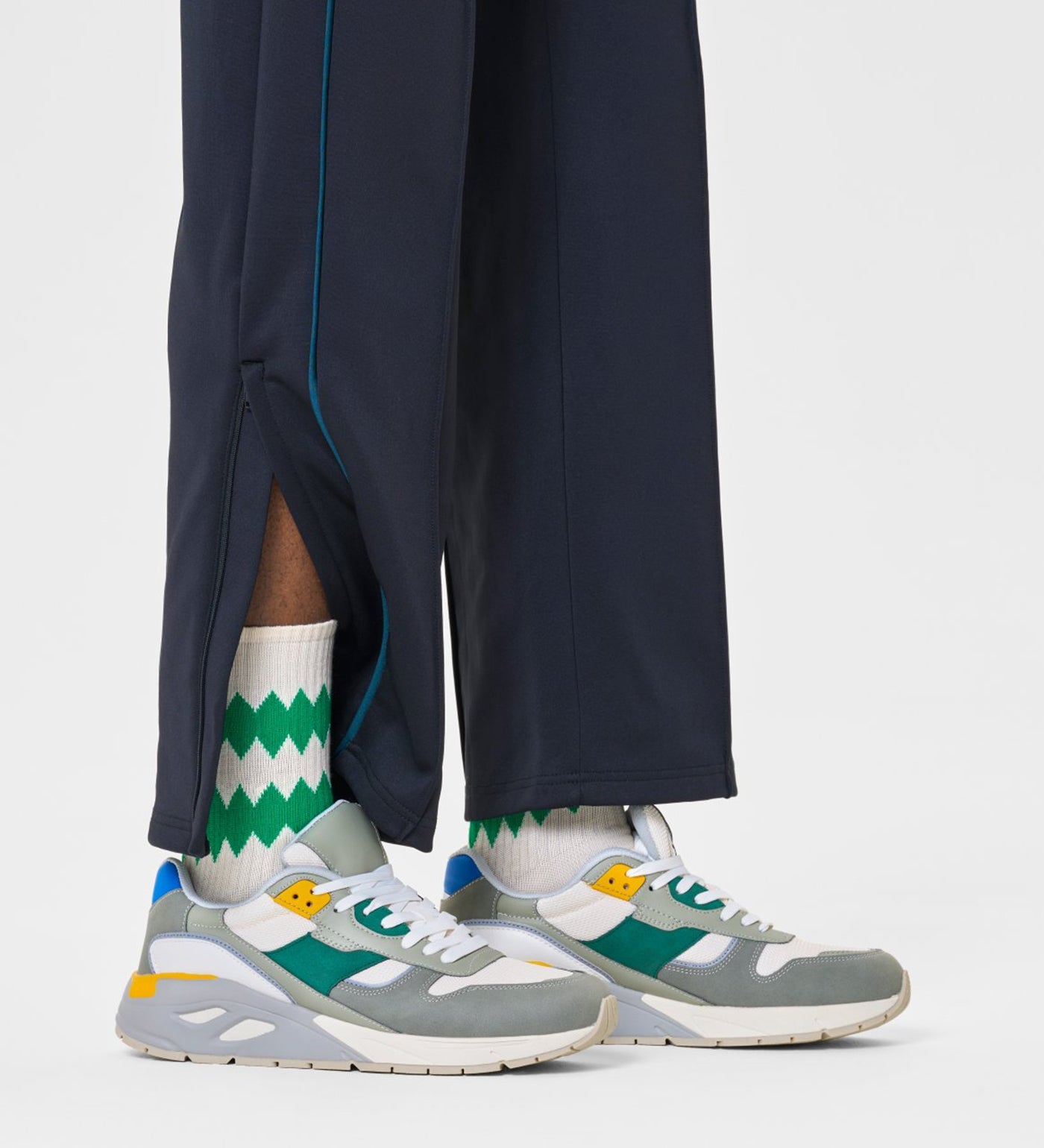 Colorful zigzag design on unisex crew socks suitable for women and men, adding fun to any outfit.