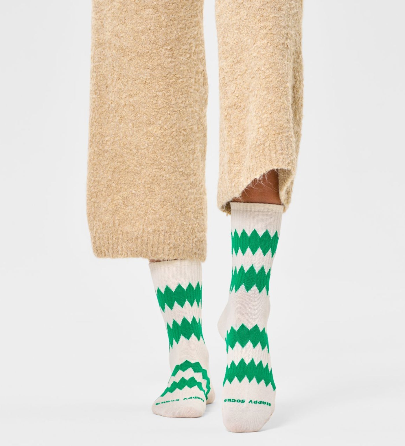 Colorful zigzag design on unisex crew socks suitable for women and men, adding fun to any outfit.