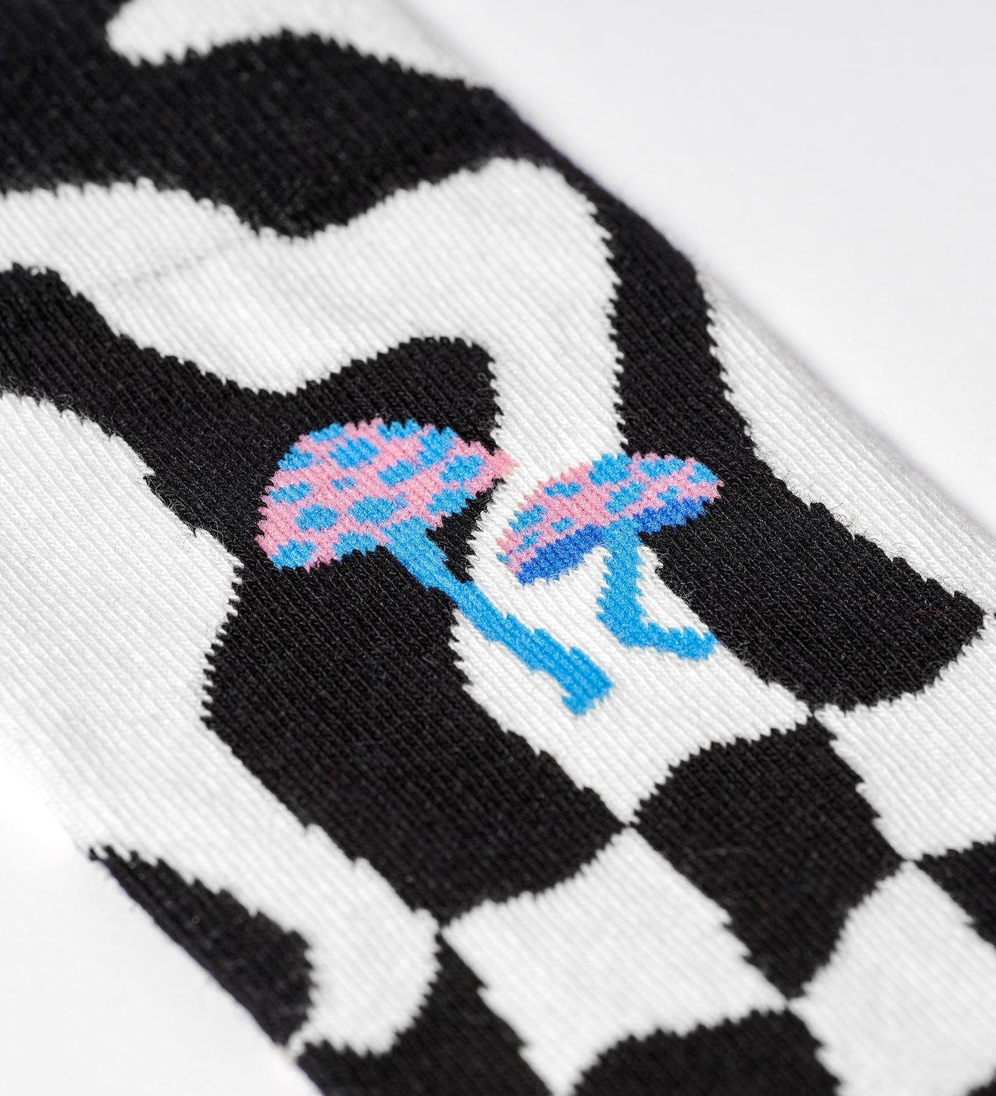 Bright, playful unisex crew socks featuring a distorted checkered pattern, suitable for women and men.