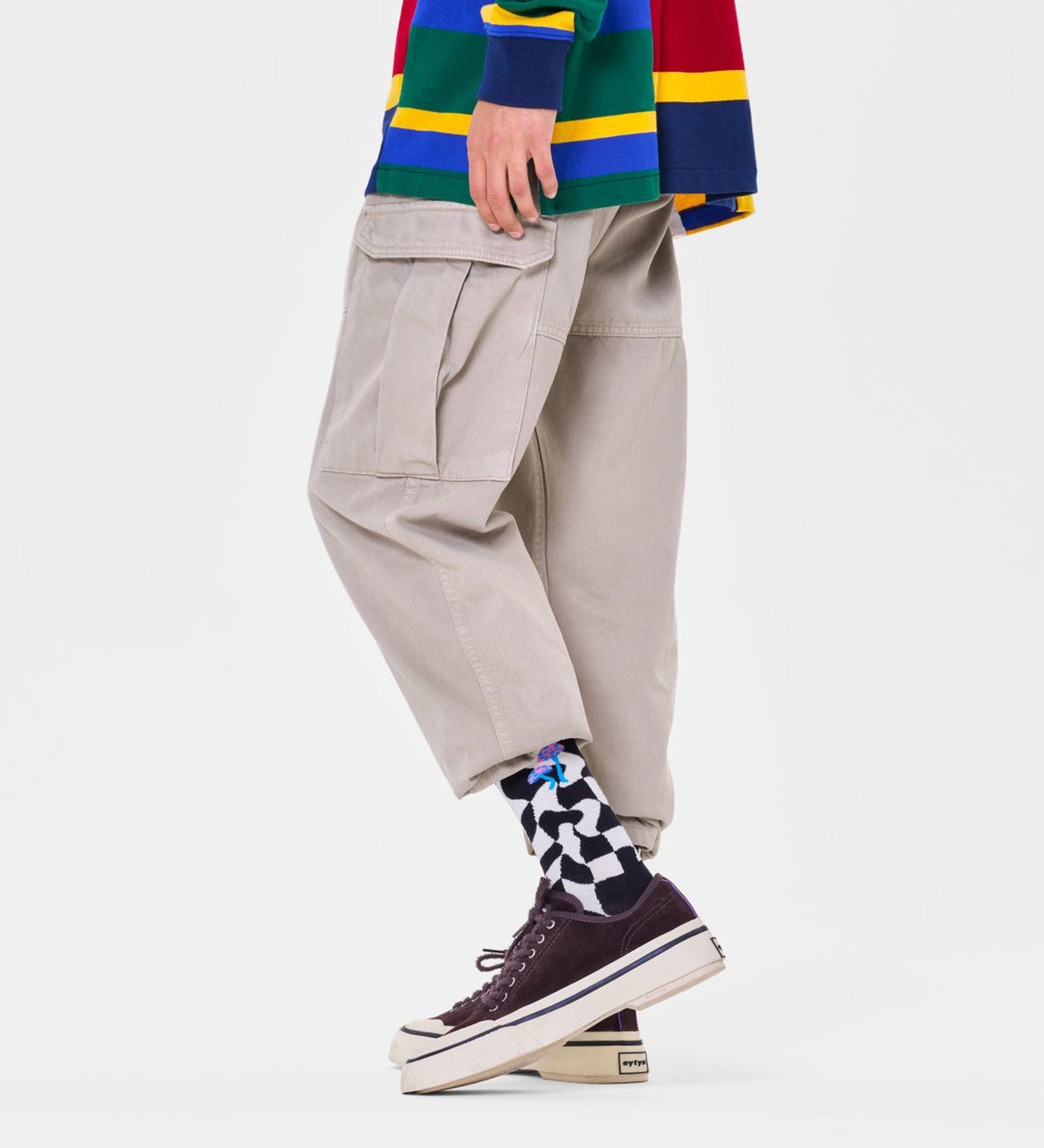 Bright, playful unisex crew socks featuring a distorted checkered pattern, suitable for women and men.