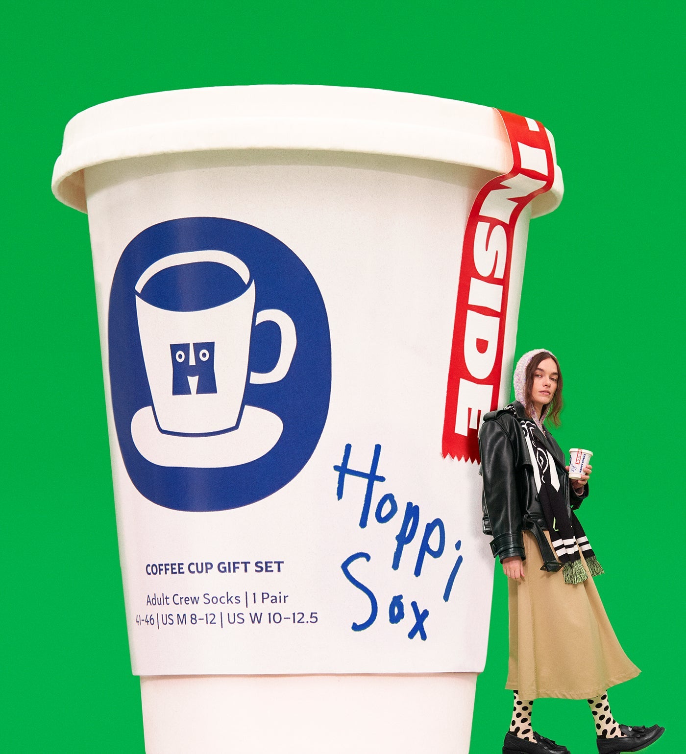 Colorful crew length socks featuring a coffee cup design, perfect as a unisex gift for both women and men.
