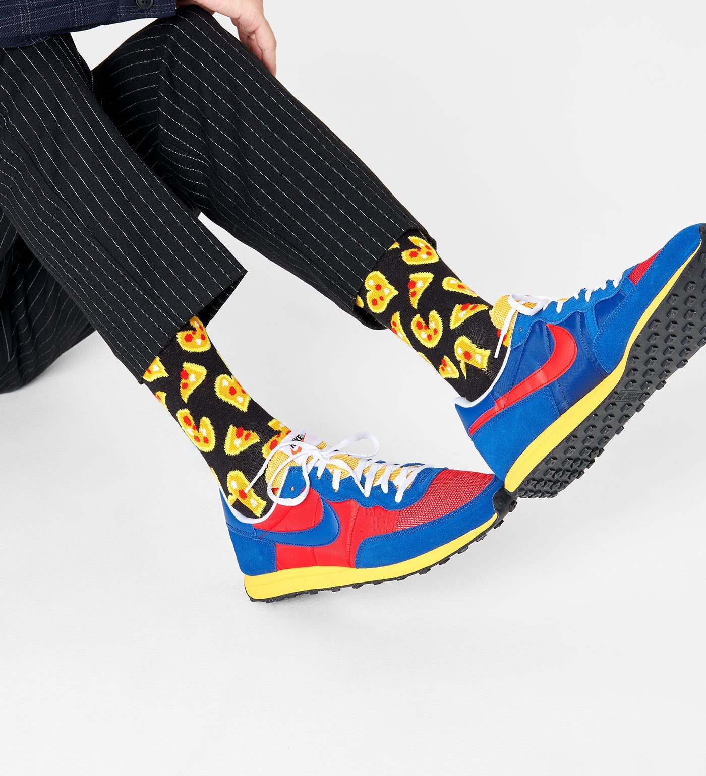 Bright, colorful Happy Socks pizza love crew socks for women and men, featuring fun pizza patterns and vibrant design.