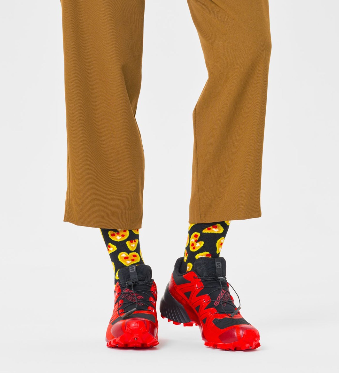 Bright, colorful Happy Socks pizza love crew socks for women and men, featuring fun pizza patterns and vibrant design.