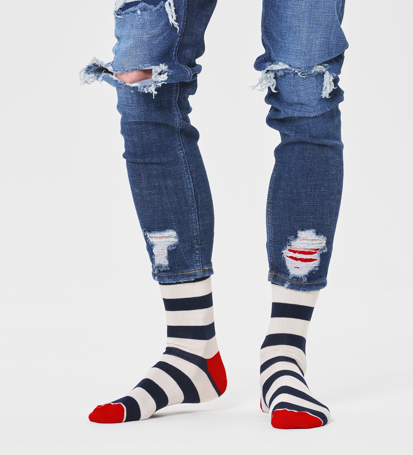 Colorful unisex stripe crew socks by Happy Socks, suitable for women and men, featuring vibrant patterns and comfortable fit.