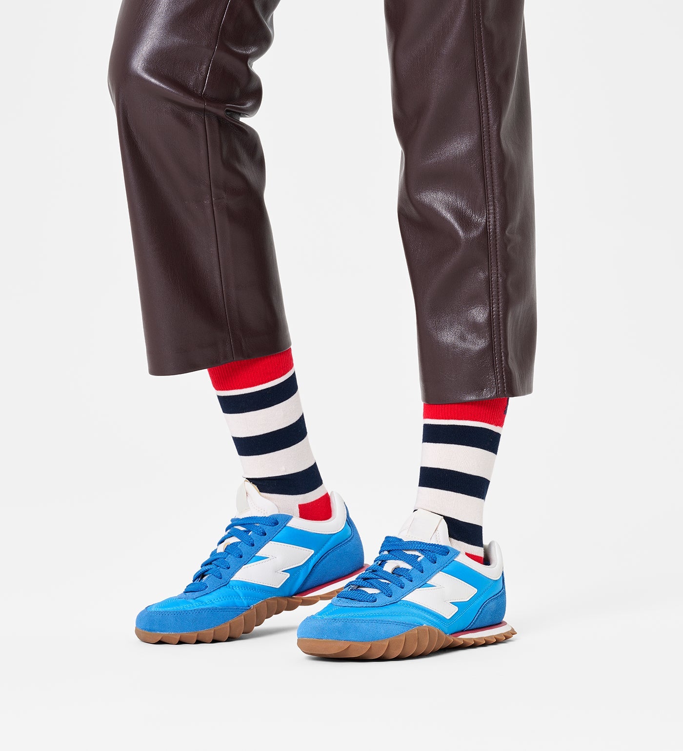 Colorful unisex stripe crew socks by Happy Socks, suitable for women and men, featuring vibrant patterns and comfortable fit.