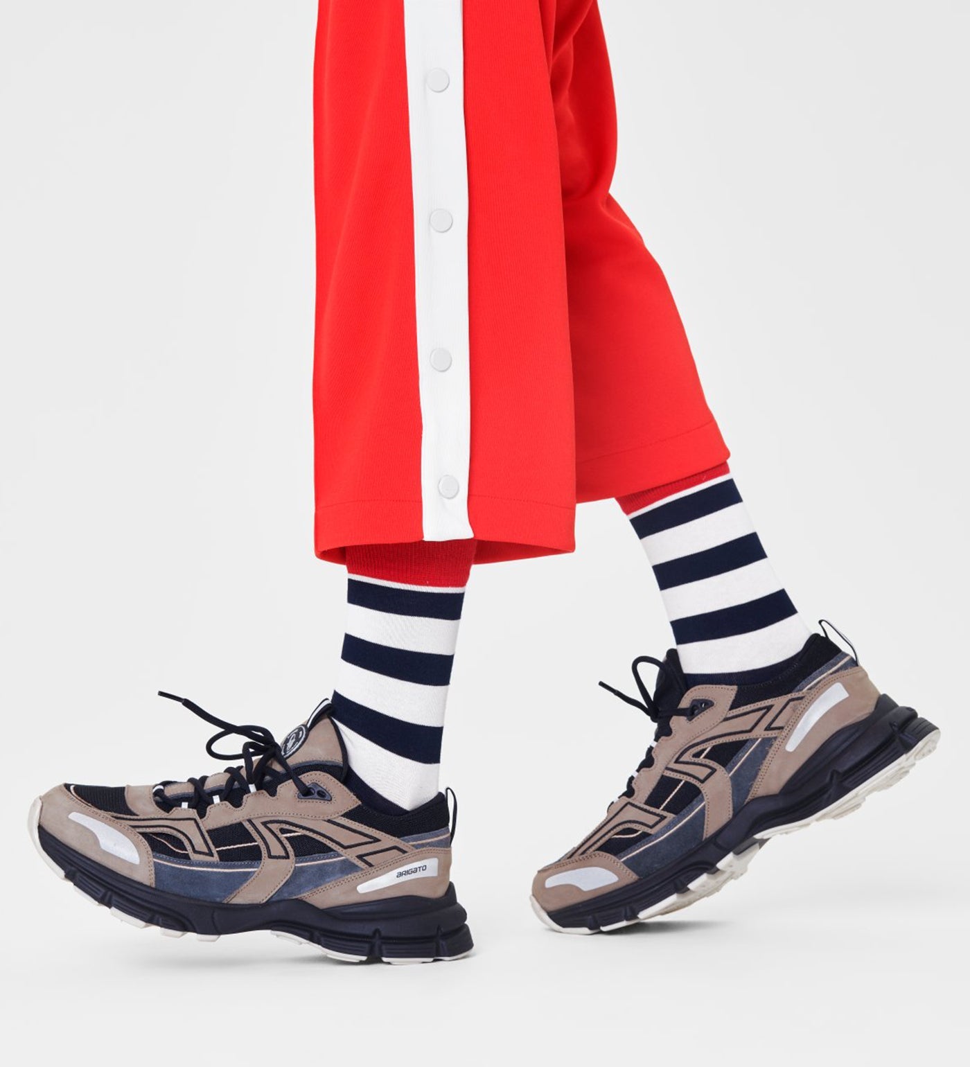 Colorful unisex stripe crew socks by Happy Socks, suitable for women and men, featuring vibrant patterns and comfortable fit.