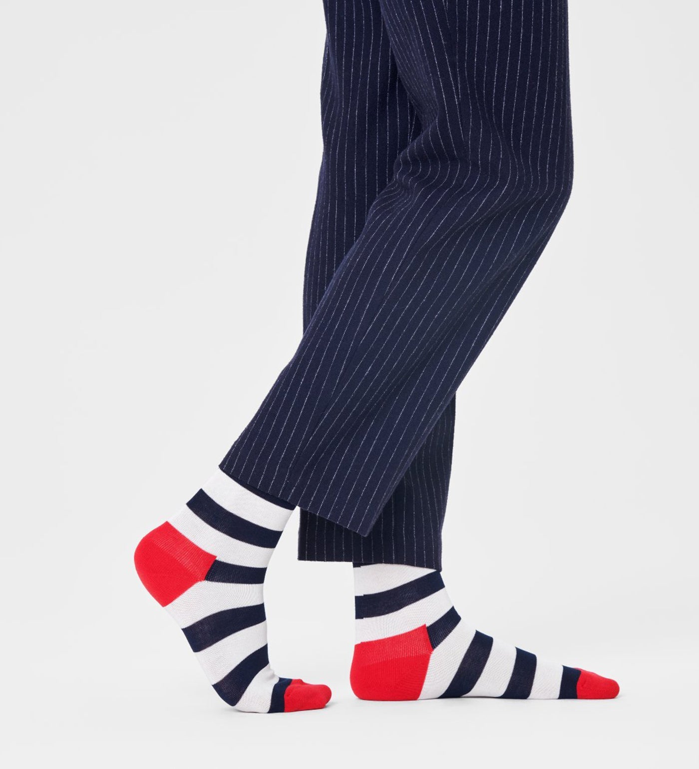 Colorful unisex stripe crew socks by Happy Socks, suitable for women and men, featuring vibrant patterns and comfortable fit.