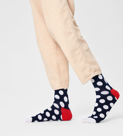 Colorful unisex crew socks featuring large dot patterns, suitable for women and men, by Happy Socks.
