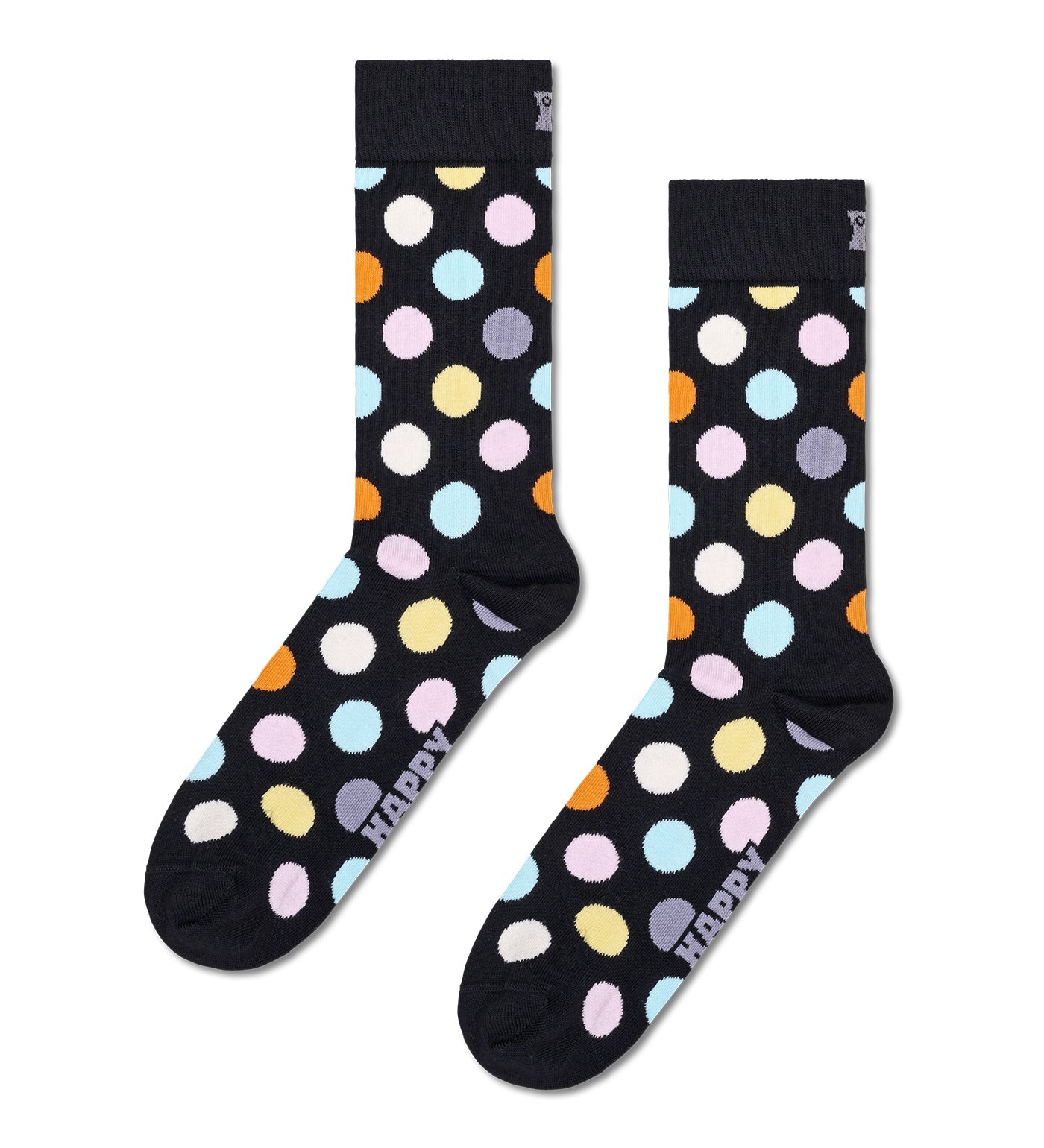Colorful unisex crew socks featuring large dot patterns, suitable for women and men, by Happy Socks.