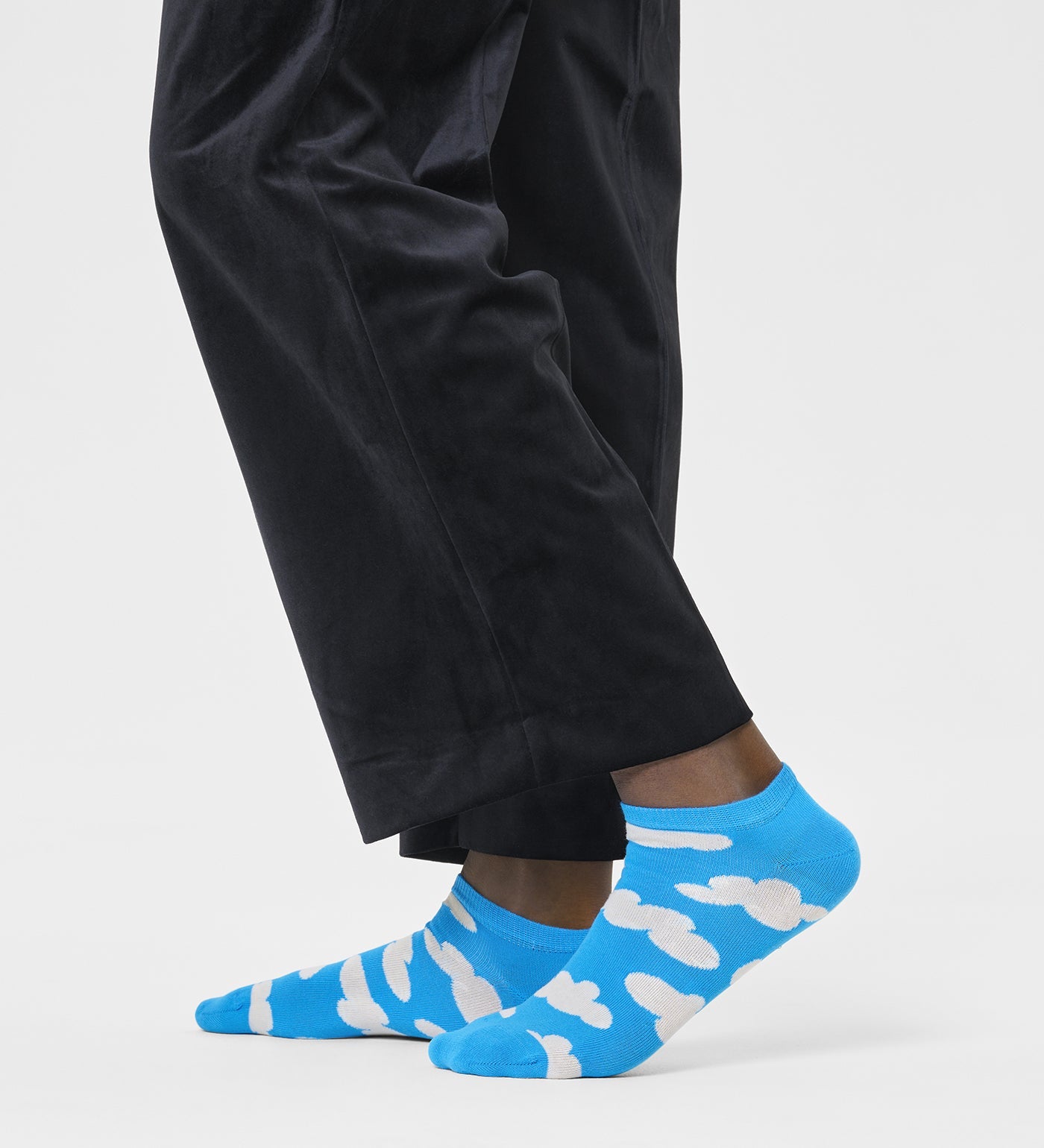 Colorful ankle length socks with a cloudy pattern, suitable for all genders. Perfect for adding a fun touch to any outfit.