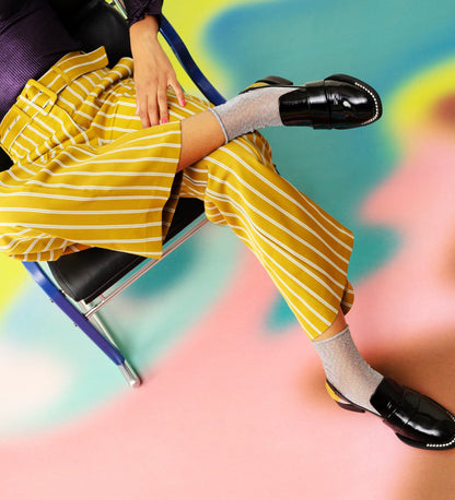 Brightly patterned Happy Socks Emma calf-length socks for women, offering vibrant style and comfortable fit for everyday wear.