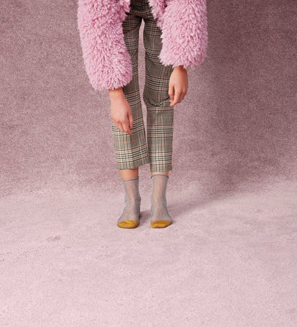Brightly patterned Happy Socks Emma calf-length socks for women, offering vibrant style and comfortable fit for everyday wear.