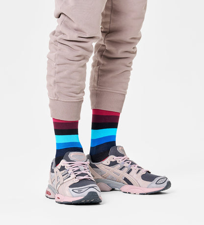 Colorful unisex stripe crew socks by Happy Socks, suitable for women and men, featuring vibrant patterns and comfortable fit.